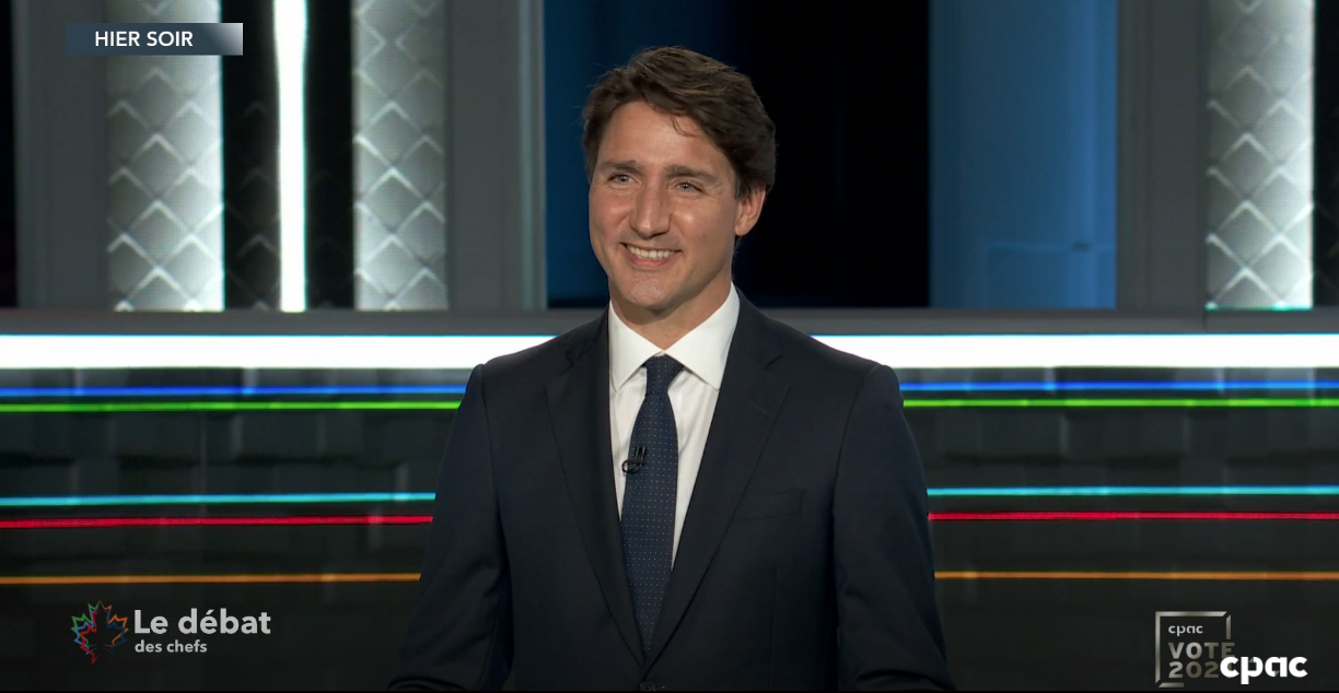 Lower your prices or else, Trudeau tells big telecom at debate